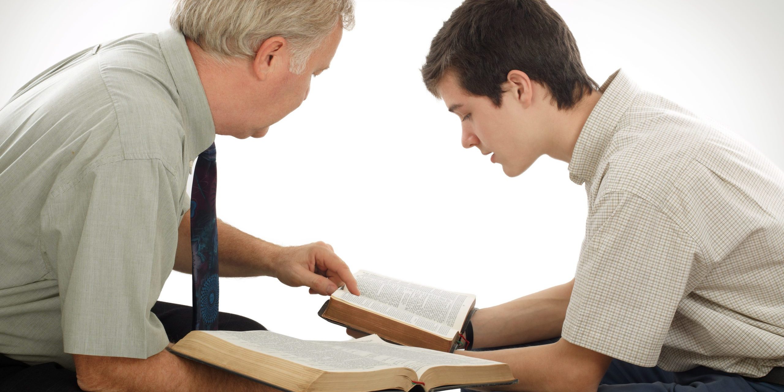Preacher explains God's Word to a young man